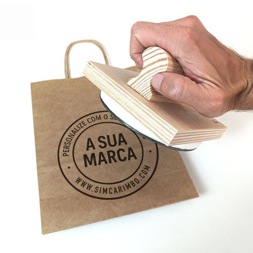 Large custom stamp on boxes and paper bags for affordable packaging branding