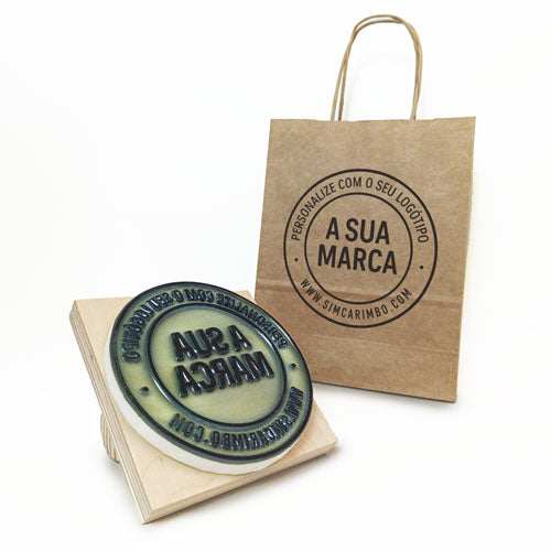 Large custom stamp on boxes and paper bags for affordable packaging branding